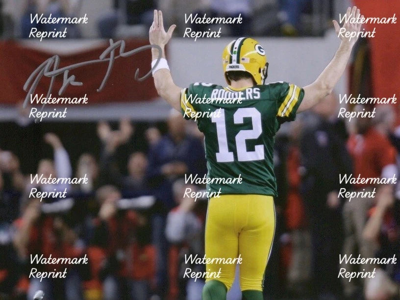 AARON RODGERS GREEN BAY PACKERS SIGNED GLOSSY PHOTO 11"X8". #1